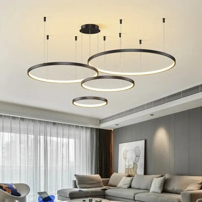 Decorbites modern black pendant light featuring dimmable circular led rings for a stylish living room ambiance