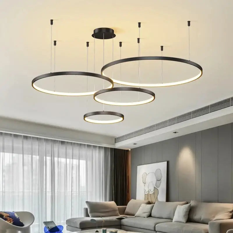 Decorbites modern black pendant light featuring dimmable circular led rings for a stylish living room ambiance