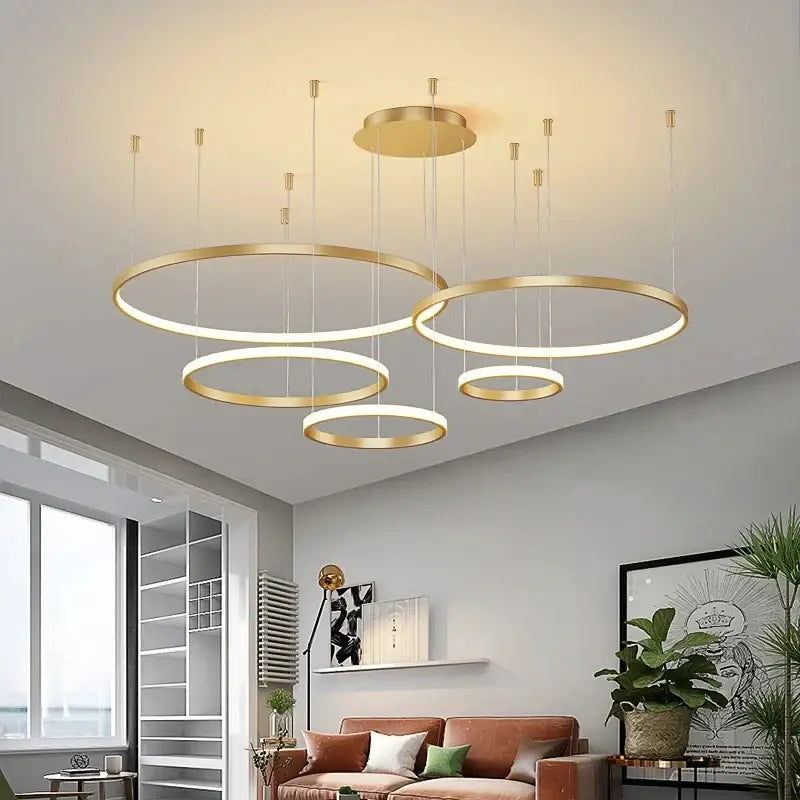 DecorBites™ modern black pendant light with gold-toned circular illuminated rings for living room lighting