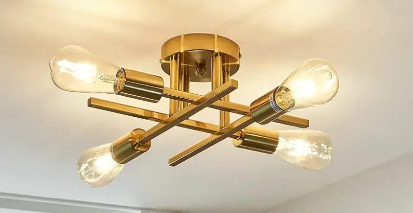 Decorbites™ modern black sputnik chandelier flush mount with gold-toned fixture and four exposed filament bulbs in geometric design