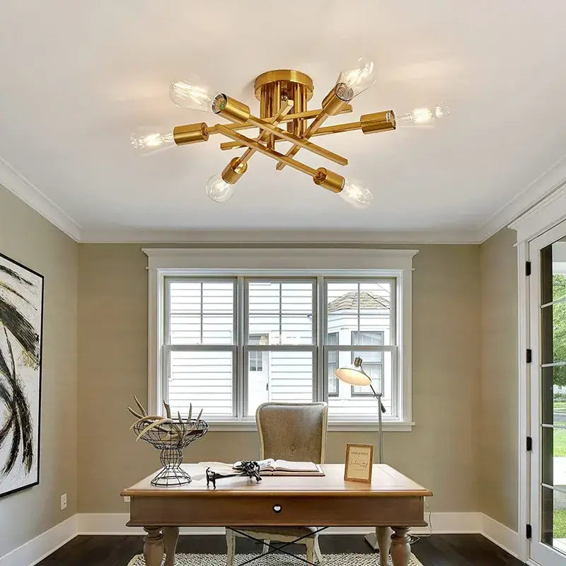 Decorbites modern black sputnik chandelier flush mount with gold-toned finish and exposed bulbs in a geometric design