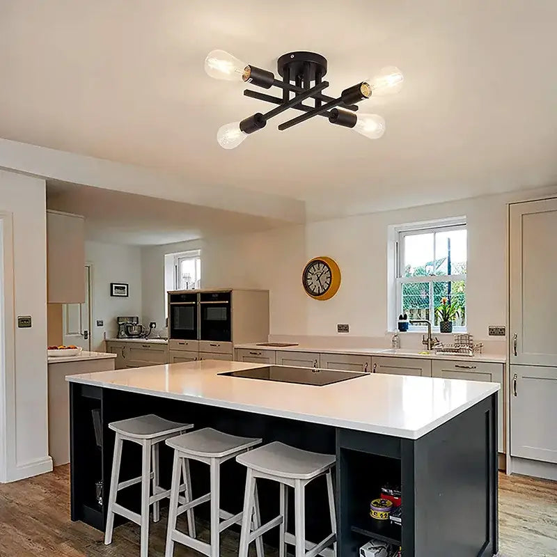Black industrial-style flush mount chandelier with four exposed bulbs and circular base by decorbites modern chandelier