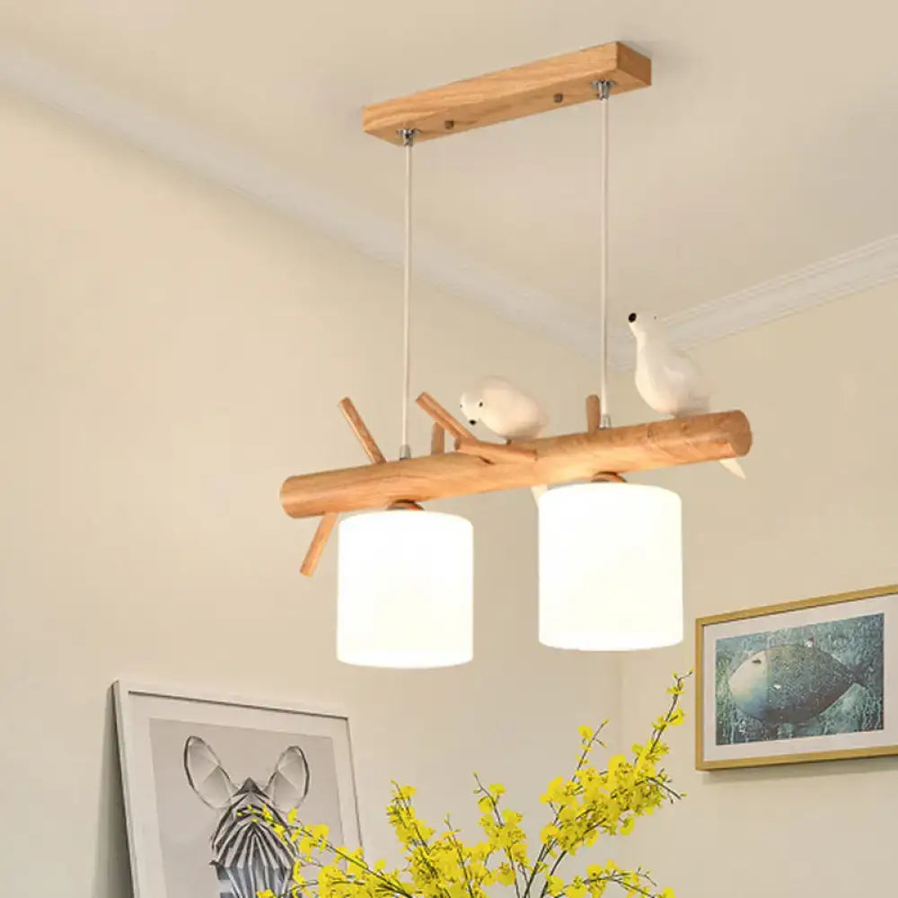 DecorBites™ modern branch island pendant light with wood fixture, cream glass shades, and bird accents for dining room ceiling