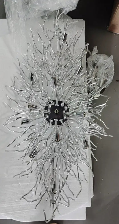 Silver metallic crystal chandelier with intricate branching arms and central black hub for living room lamp package