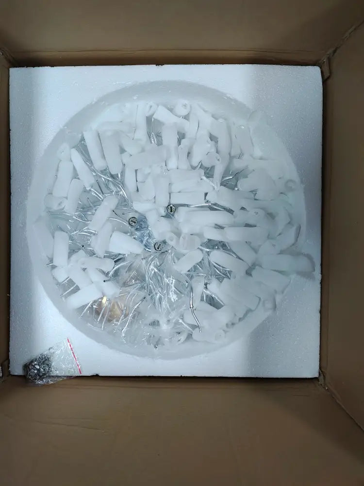 White plastic and metal components of decorbites modern chrome crystal chandelier lamp package for living room lighting