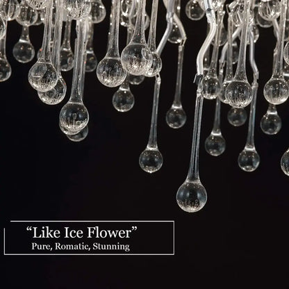 DecorBites modern chrome crystal chandelier with clear glass teardrop elements and intricate frosted detailing