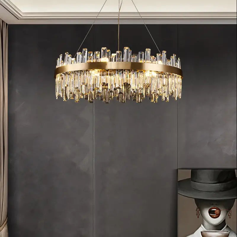 DecorBites™ modern crystal chandelier with gold-toned metal frame and cascading rods for dining room lighting