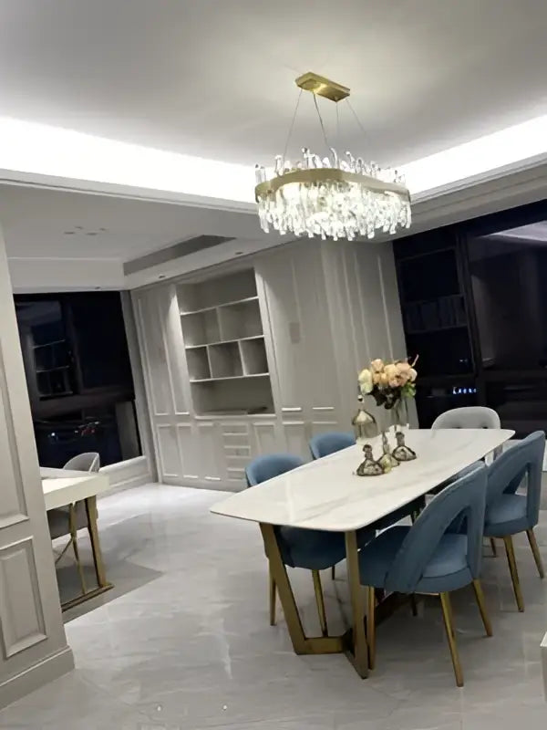 Decorbites™ modern crystal chandelier with golden chrome circular frame and clear faceted crystals for dining room lighting
