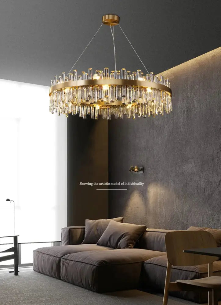 Gold-toned circular DecorBites™ crystal chandelier with dangling clear rods in golden chrome for dining room lighting