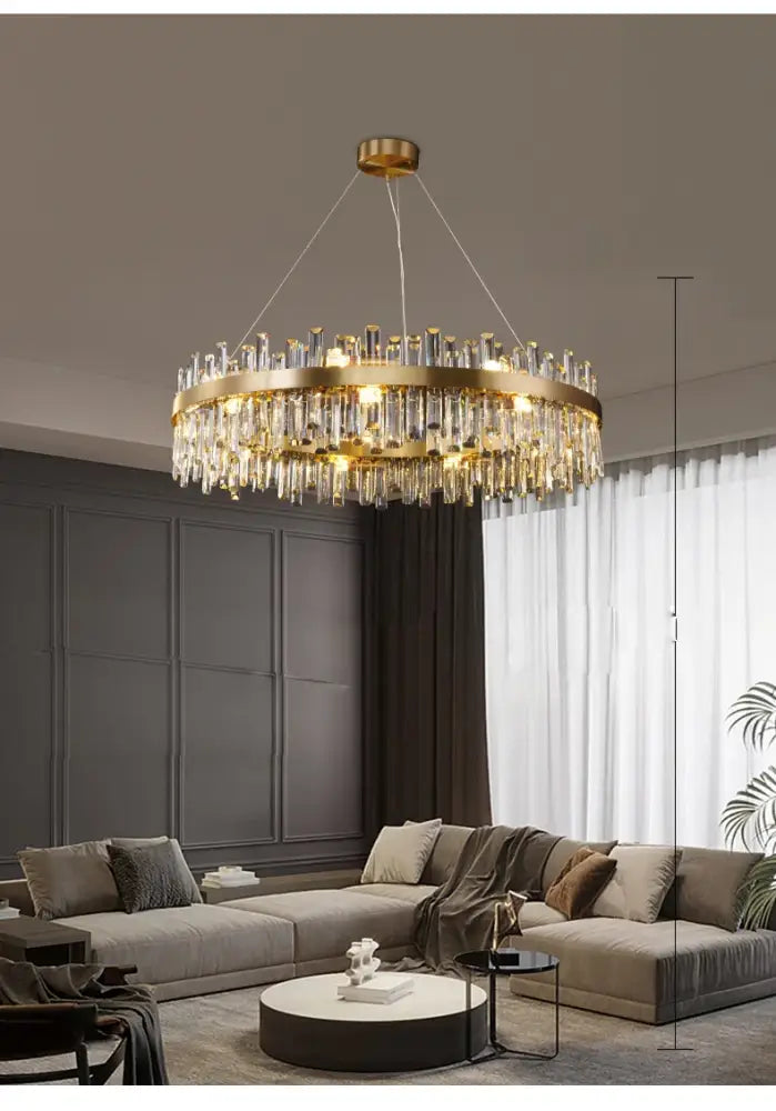 Gold-toned decorbites™ modern crystal chandelier with cascading prisms and golden chrome frame for dining room lighting
