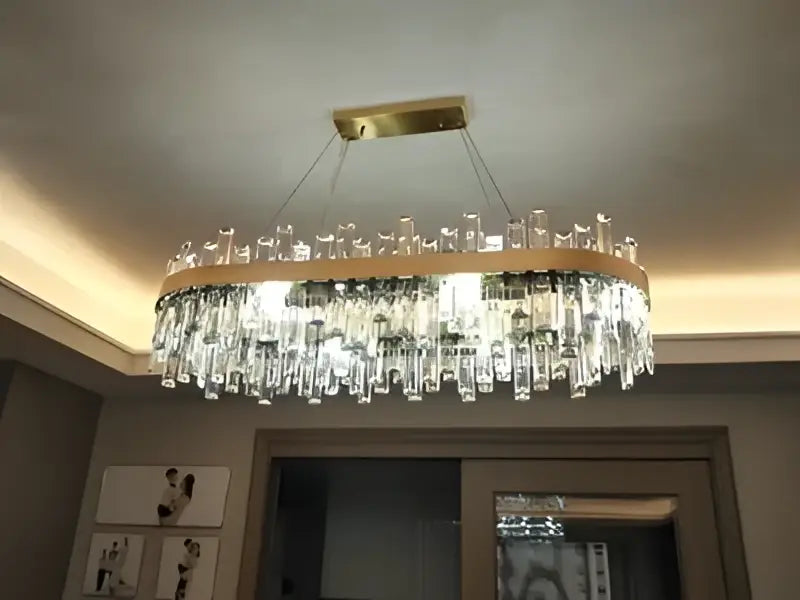 DecorBites™ modern crystal chandelier with clear prisms and golden chrome frame for elegant dining room lighting
