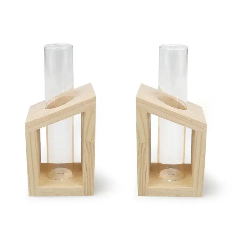 Light-colored wooden stands holding clear decorbites™ modern crystal glass test tube vases for decorative use