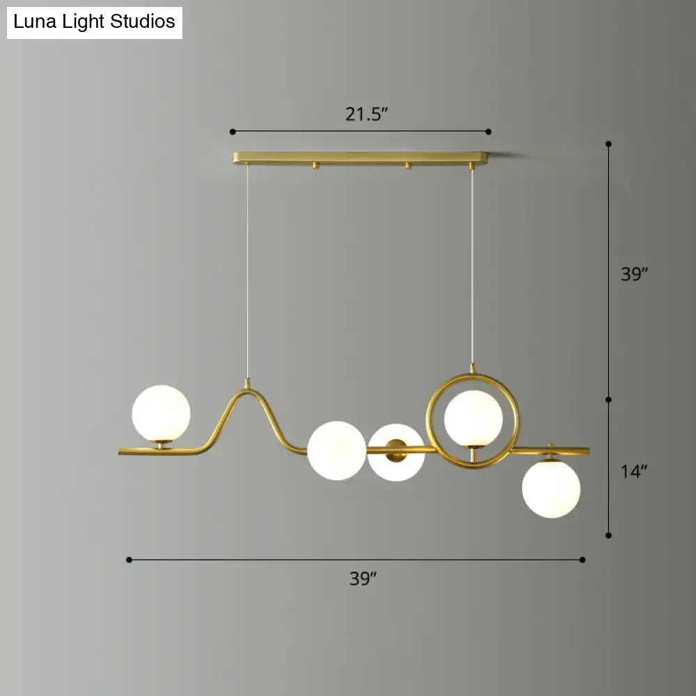 Gold-toned decorbites modern curve island ceiling light with curved metal frame and five frosted glass globes for dining room
