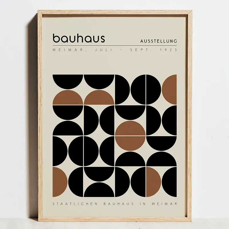 Minimalist framed poster with geometric bauhaus black and tan circles on off-white background for bauhaus exhibition posters