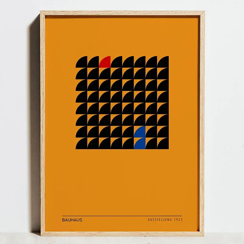 Orange-framed DecorBites™ wall art featuring geometric bauhaus exhibition black semicircles with red and blue accents