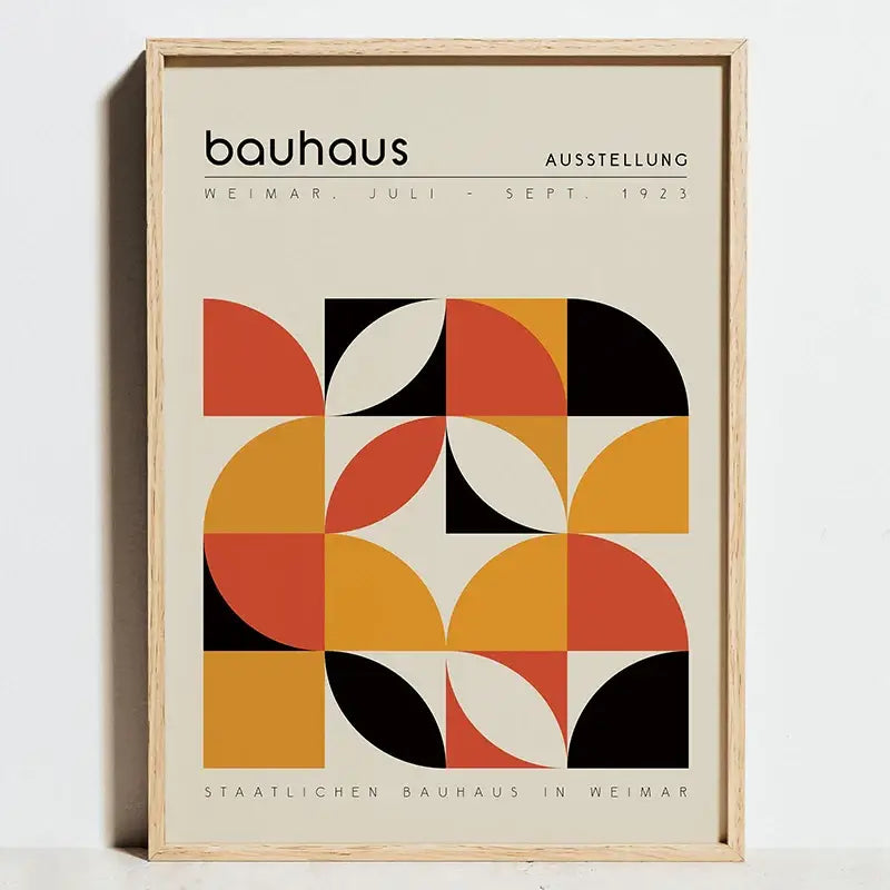 A framed DecorBites™ modern geometric bauhaus wall art print with bold orange black and cream shapes on off-white background