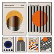 Set of five DecorBites™ modern geometric canvas wall art prints with bold black white orange and blue patterns on cream backgrounds