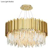 Gold-toned DecorBites™ crystal prism chandelier with vertical brass bars and cascading prisms for living room island lighting