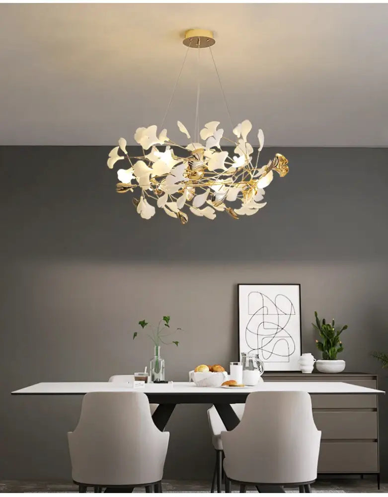 DecorBites modern ginkgo leaf LED chandelier with white and gold brass leaves for dining room lighting