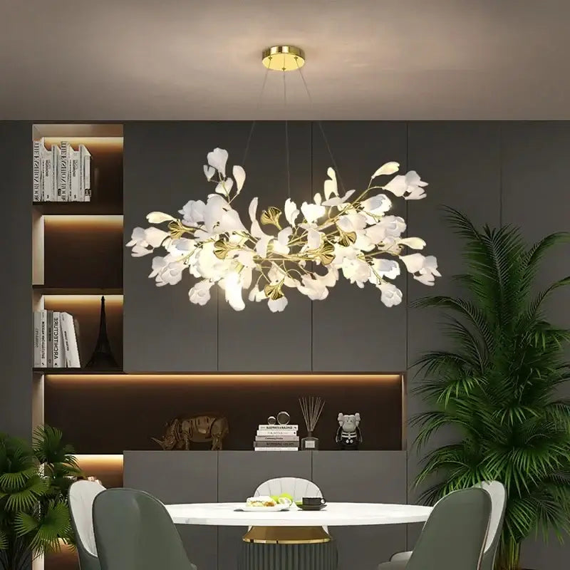 Decorbites modern ginkgo leaf led chandelier with white floral petals and gold metal branches for dining room lighting