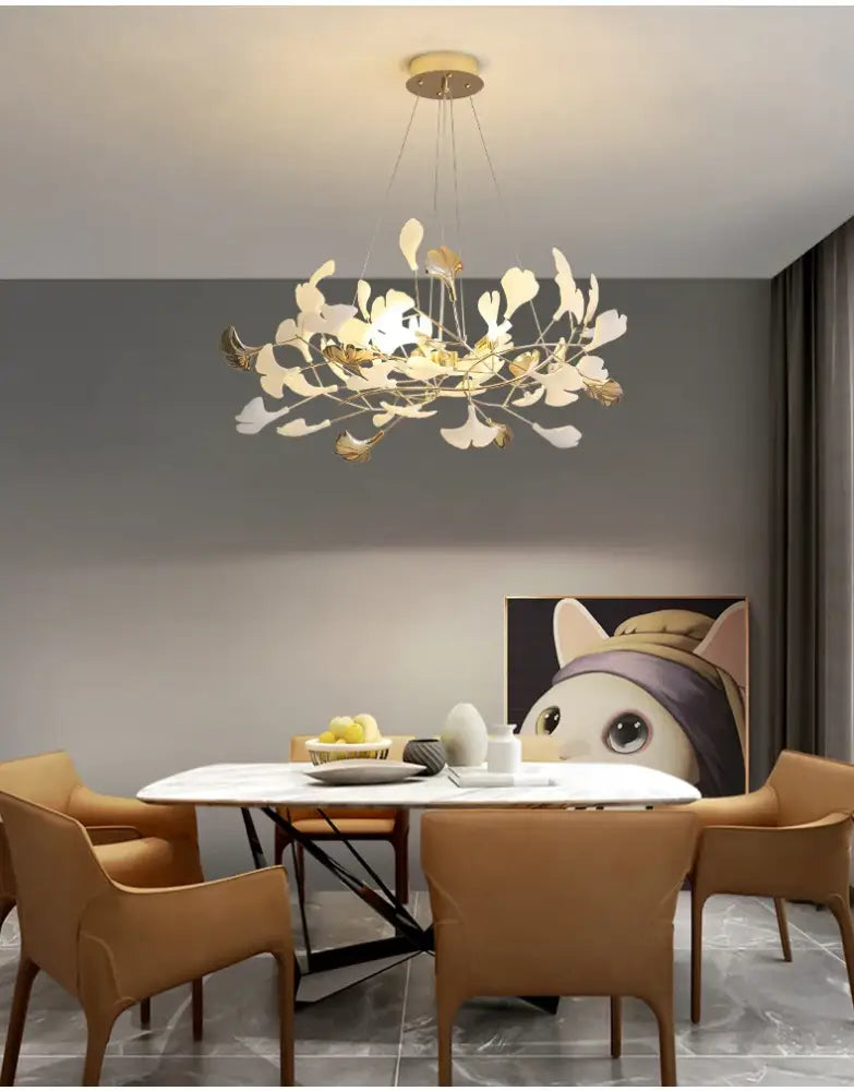 DecorBites™ modern ginkgo leaf LED chandelier with gold-toned metal and white arms for dining room lighting
