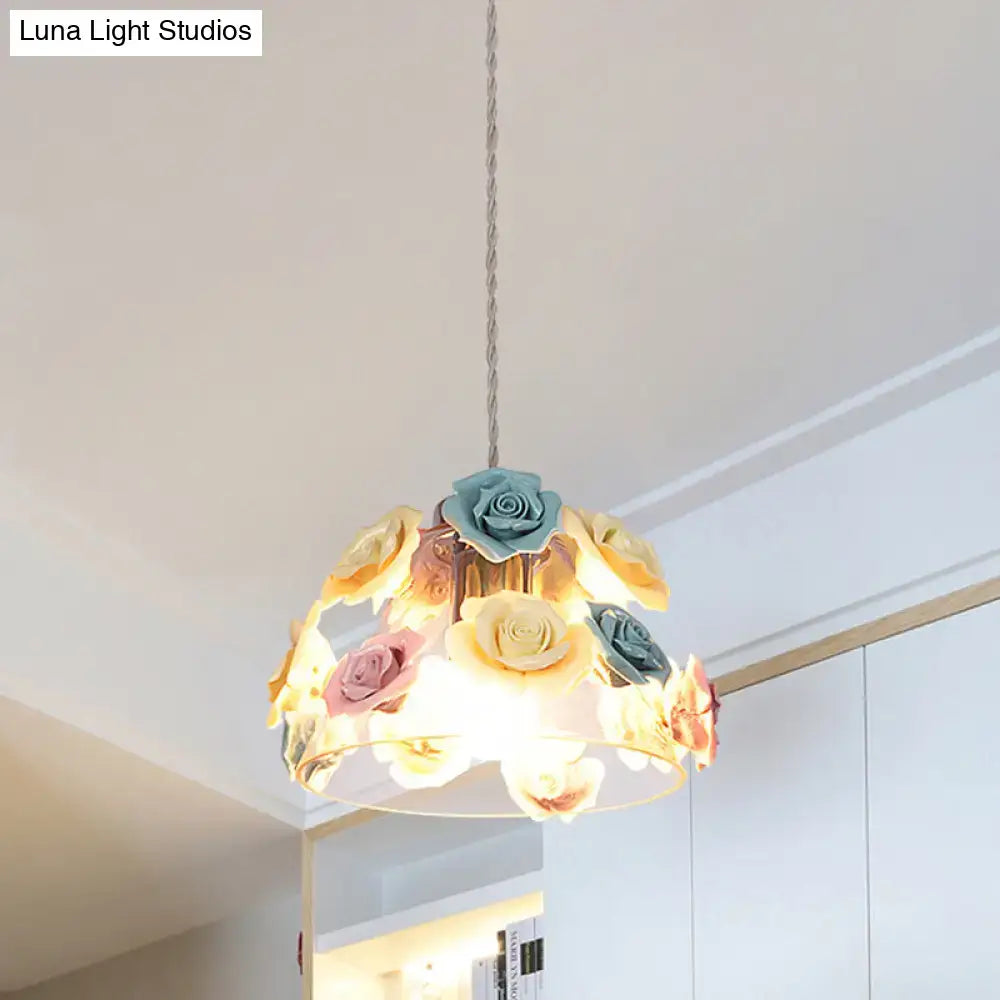 Decorbites modern glass hanging lamp featuring pastel blue-pink-yellow flower decor with transparent glass shade