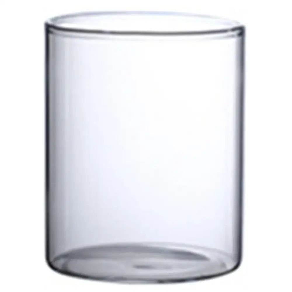 Clear glass hydroponic vase with smooth cylindrical shape and rounded rim for modern wedding decor by decorbites