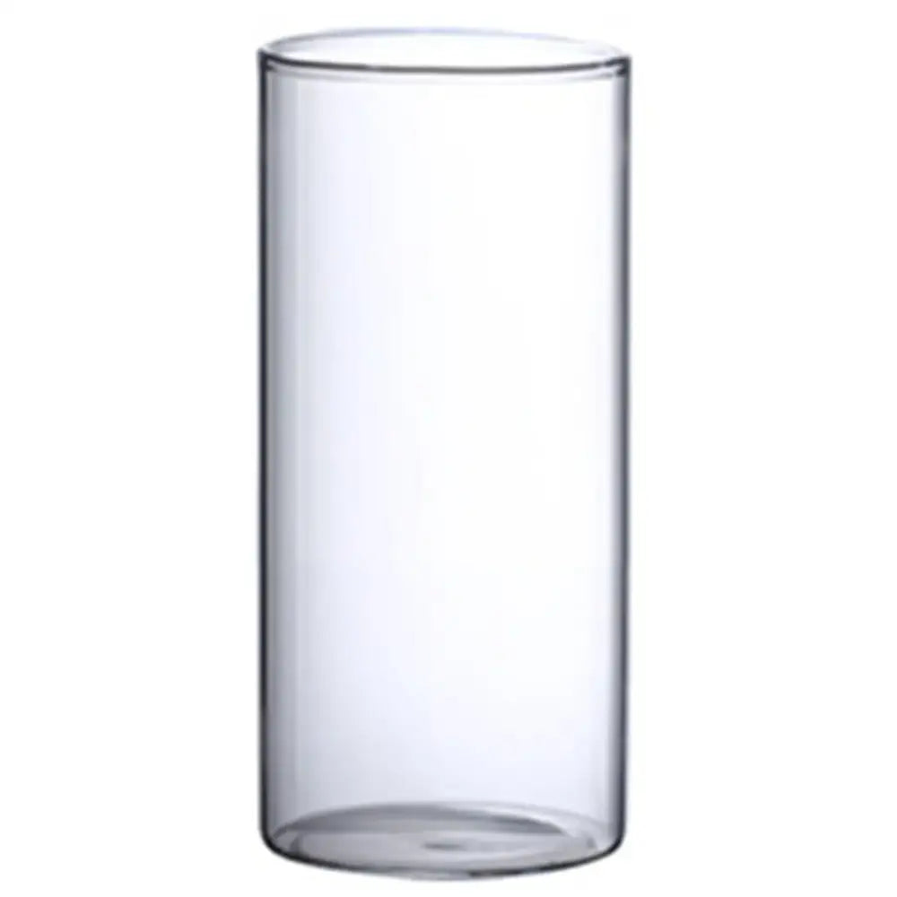 Clear cylindrical glass hydroponic vase with smooth transparent walls and rounded base for wedding decor by decorbites
