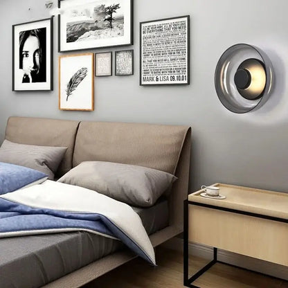 Decorbites modern glass led wall light with sleek metallic circular design and warm interior lighting for indoor use
