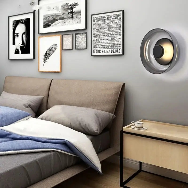 Decorbites modern glass led wall light with sleek metallic circular design and warm interior lighting for indoor use
