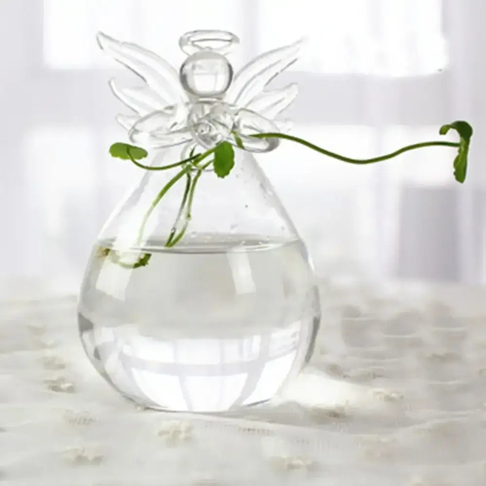 DecorBites™ modern clear glass vase terrarium shaped like an angel with delicate wings holding a green vine