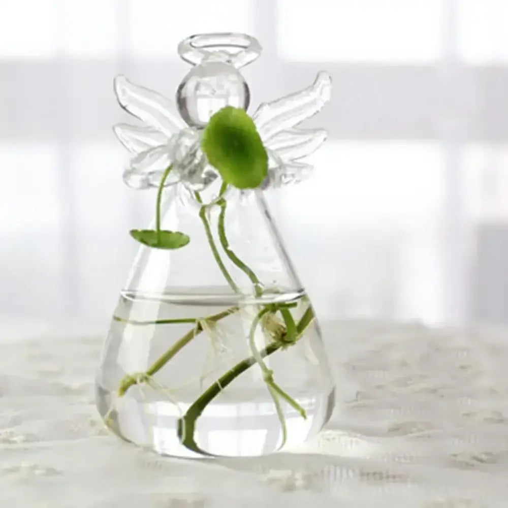 DecorBites™ modern glass vase terrarium shaped like a clear angel holding green aquatic plants in water