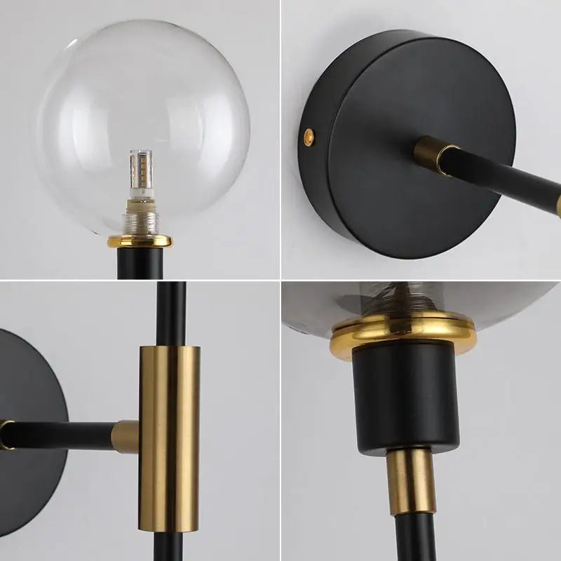 DecorBites™ modern glass wall sconce in black and gold with a clear glass globe bulb for stylish lighting