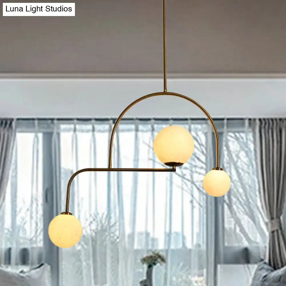 Decorbites modern global bedroom chandelier with yellow white frosted glass globes and brass-finished pendant light