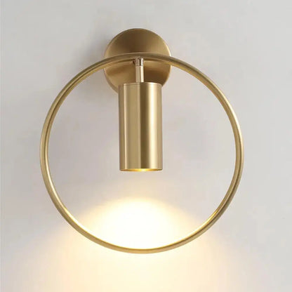 DecorBites™ modern black gold wall sconce with brass-finished circular base and cylindrical wall lamp fixture