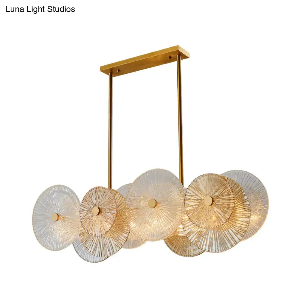 Decorbites™ modern gold finish pendant light with prismatic glass shade featuring 8 bulbs for dining room use