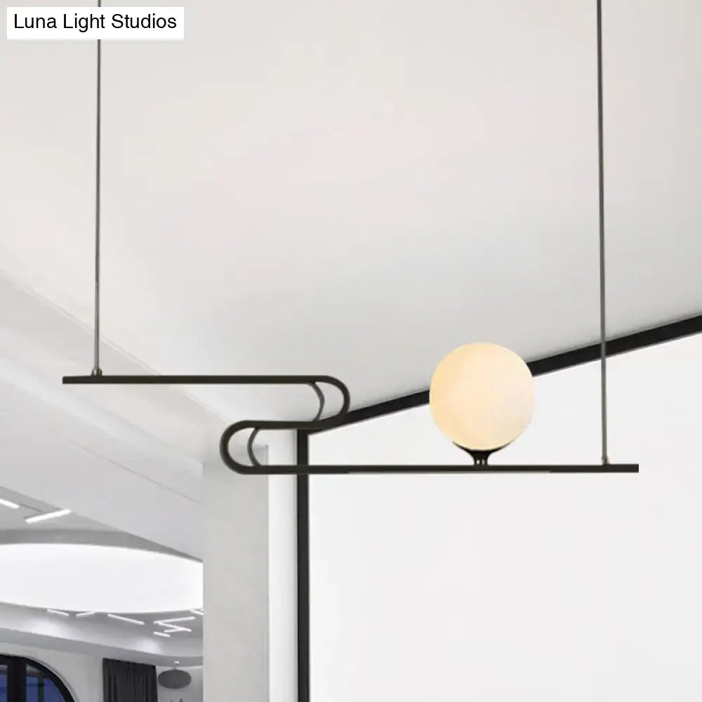 DecorBites™ simplicity modo hanging chandelier with modern black metal and warm frosted glass globe for dining hall island
