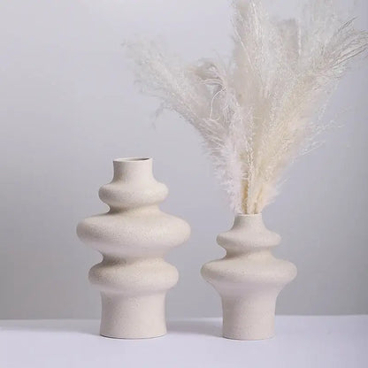 Cream-colored decorbites modern ins style ceramic spiral vase with textured speckled finish and stacked rounded tiers