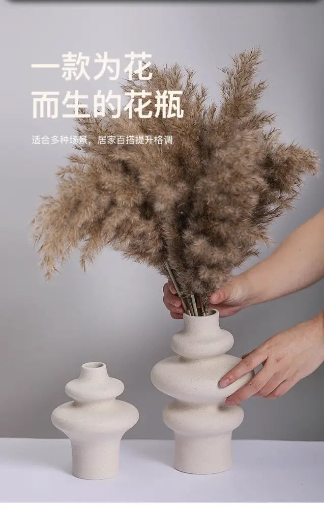 Cream-colored DecorBites™ modern ins style ceramic spiral vase with stacked rounded segments and wide opening