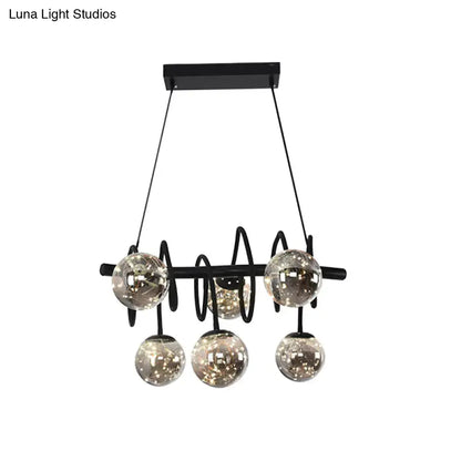 Decorbites modern island pendant light with five smoke gray glass shade orbs and black metal frame ideal for dining room