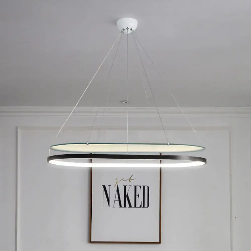 Decorbites modern led acrylic dual oval pendant chandelier with sleek black gold frame illuminated by led lighting