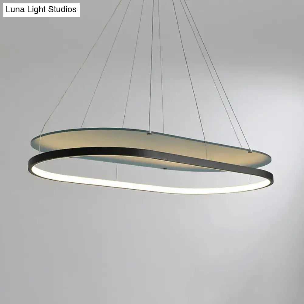DecorBites modern black gold pendant chandelier with dual oval LED acrylic rings and warm diffused glow for dining room