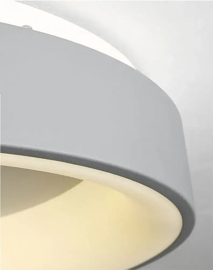 Gray cylindrical ceiling light with smooth matte finish and warm diffuser modern led ceiling light by decorbites