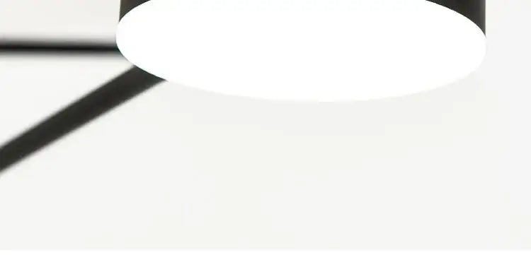 Black circular modern led chandelier with smooth matte finish perfect for living room and bedroom lighting