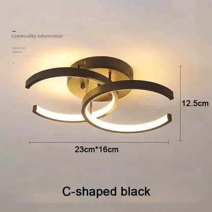DecorBites™ modern black c-shaped led chandelier with sleek intersecting rings and warm glow in three color options