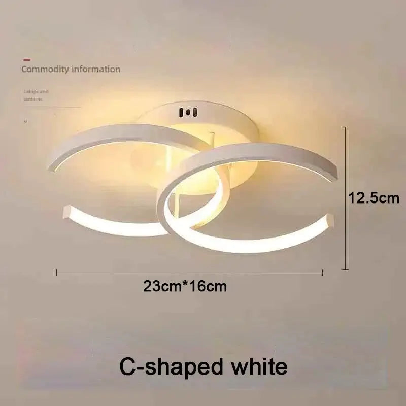 Modern white c-shaped decorbites™ led chandelier with sleek minimalist design and three color options for household use