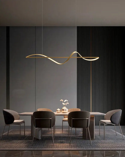 Gold-toned sleek curved linear pendant light with modern wave design from DecorBites™ modern led chandeliers