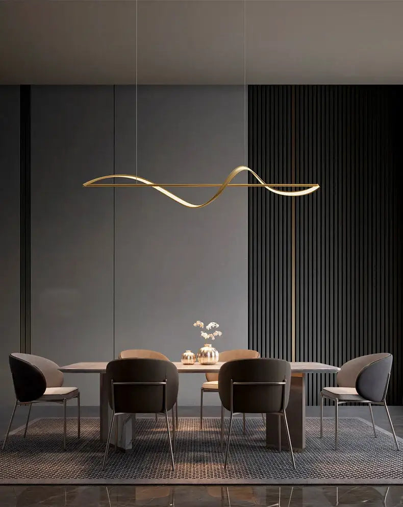 Gold-toned sleek curved linear pendant light with modern wave design from DecorBites™ modern led chandeliers