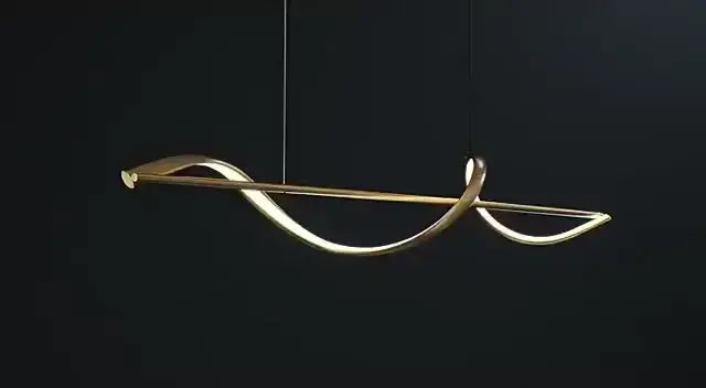 A sleek modern pendant light with flowing gold-toned metal design and smooth curves from decorbites modern led chandeliers