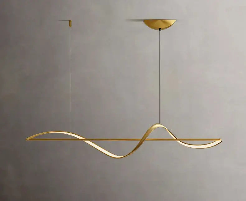 A sleek gold-toned pendant light with a wave design from DecorBites™ modern led chandeliers for dining or bedroom